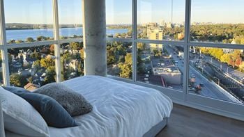 Bedroom with floor to ceiling windows